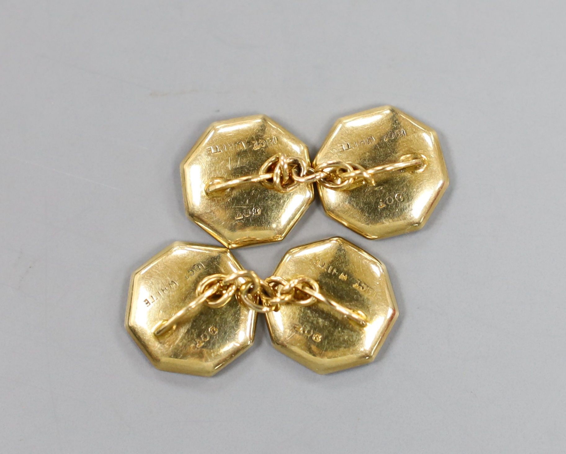 A cased pair of 18ct, 9ct, mother of pear and seed pearl set circular cufflinks, 13mm, gross weight 4.8 grams.